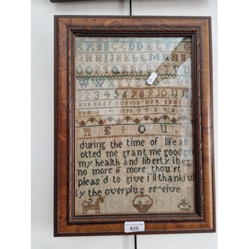 835 - An 18th century sampler, dated 1778, framed and glazed 32cm x 44cm (overall).