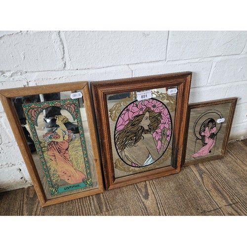 851 - Three decorative/advertising mirrors.