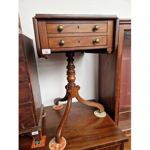 864 - A Regency mahogany pedestal Pembroke table.