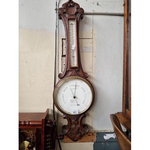 883 - An early 20th century barometer/thermometer, the dial marked 'W Aronsberg Optician, Manchester & Lee... 