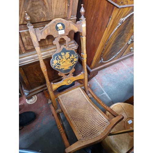 872 - An inlaid walnut and cane seat folding chair, circa 1900.