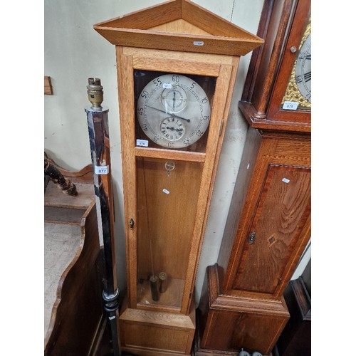 876 - A mid 20th century oak cased Granddaughter clock.