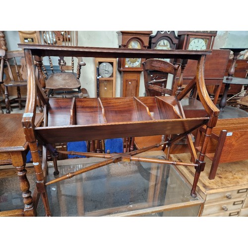 896 - A Regency style mahogany book trough/table.