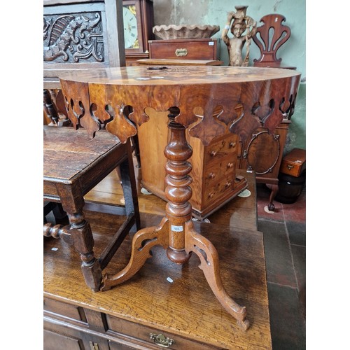 903 - A Victorian oak and walnut parquetry inlaid pedestal table with various specimen woods to the top.