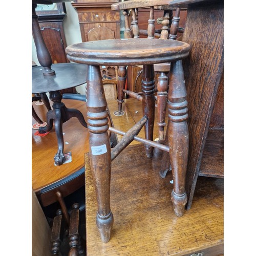 900 - A Victorian beech and elm stool.