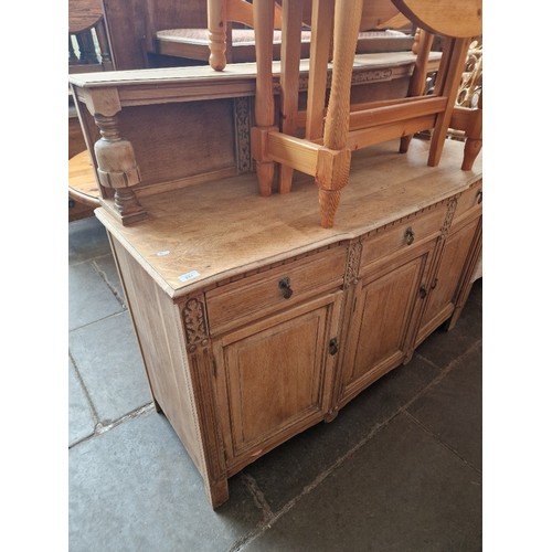 921 - A 1930s stripped oak court cupboard.