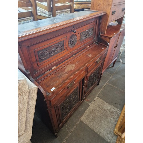 923 - A Victorian walnut secretaire base.