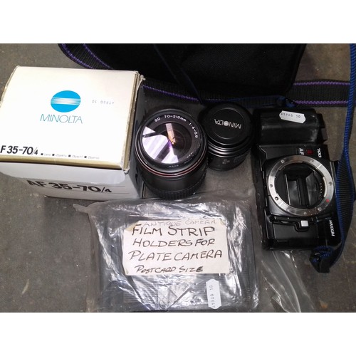 65 - A Minolta Maxxum 7000 camera with three lenses, an Olympus Trip and a batch of plate camera strip ho... 