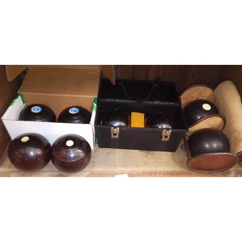 71 - Four sets of crown green bowls.