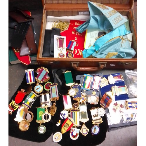 72 - A suitcase containing masonic regalia including medals and a box containing Masonic ledgers