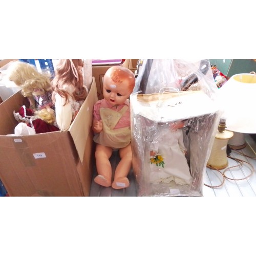 118 - A box of dolls and 2 others