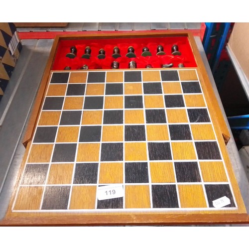 119 - A boxed chess set with cast metal pieces