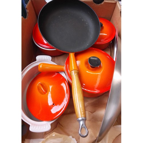 167 - A ox containing 3 Le Creuset sauce pans and a Le Creuset style frying pan and casserole dish