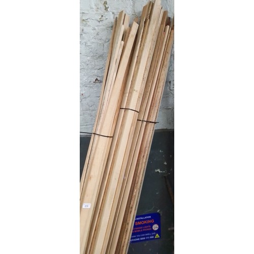 215 - Three bundles of hardwood slats