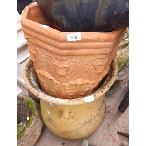 228 - 2 large terra cotta planters, one octagonal and one urn shape