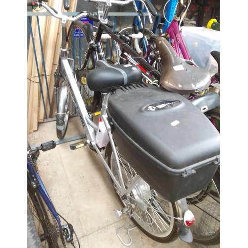 219 - A Powabyke Shopper E-100 electric bicycle with charger and accessories.