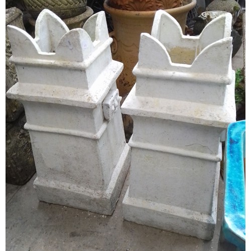 239 - A pair of chimney pot crowns