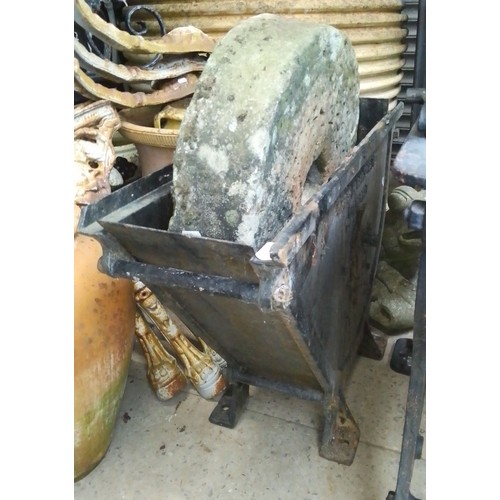 250 - A hand operated stone grinding wheel with separate frame