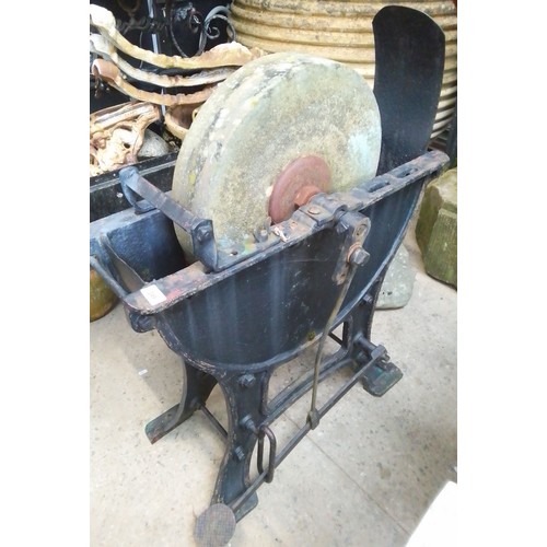 249 - A stone grinding wheel, foot operated