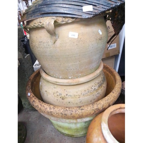 248 - 8 terra cotta planters ranging from medium to large