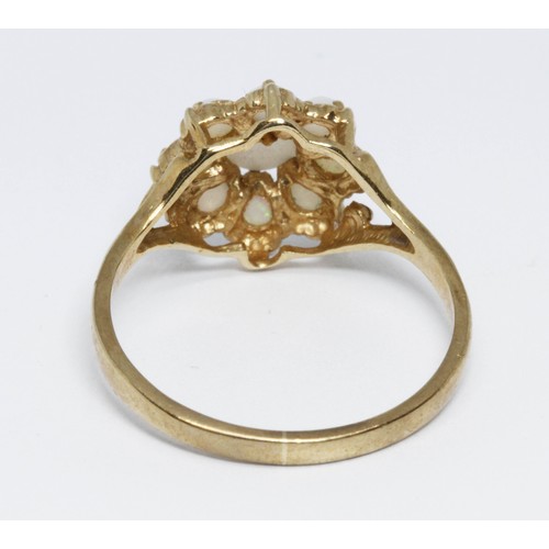 137 - A 9ct gold opal cluster ring, the cluster 11mm in diameter, London 1991, gross weight 2.2g, size O.