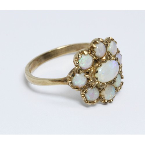 136 - A 9ct gold opal cluster ring, the cluster measuring approximately 13mm x 14mm, sponsor 'PR', Birming... 