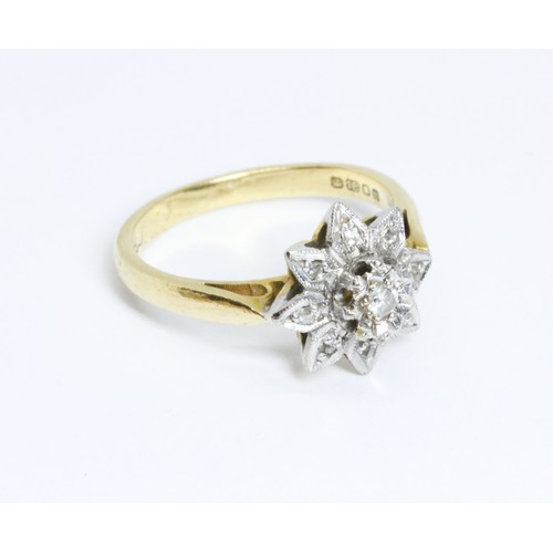 152 - An 18ct gold diamond cluster ring, the star cluster measuring approximately 11mm x 11mm, sponsor 'J&... 