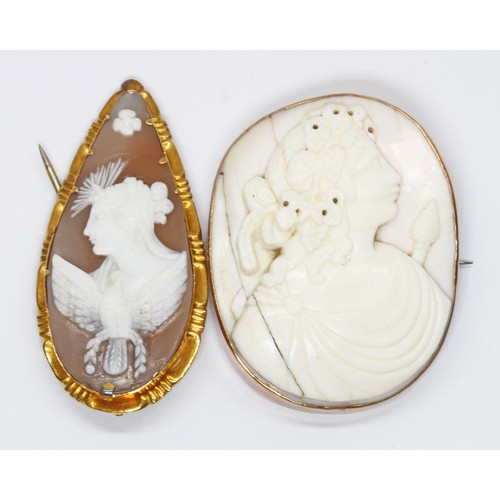 156 - Two 19th century shell cameo brooches, one marked '9ct', length 52mm and 45mm, gross weight 32.2g.