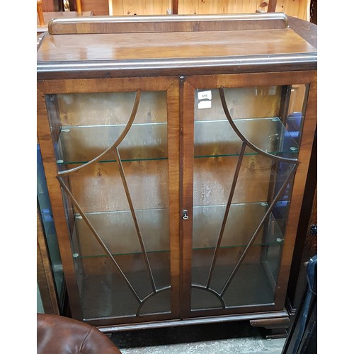 956 - A 1930s Art Deco walnut display cabinet.