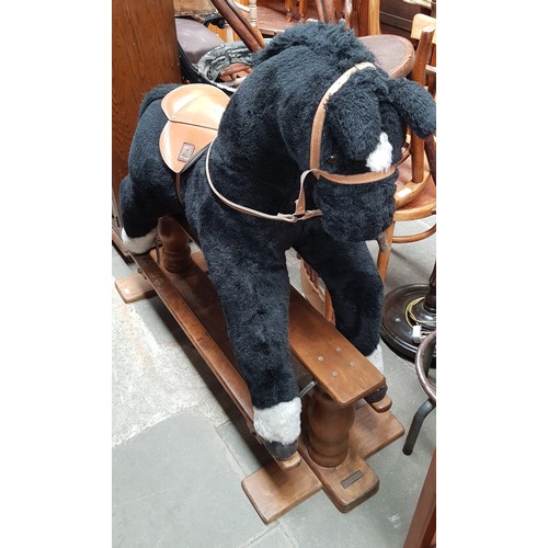 959 - A large Mamas & Papas rocking horse.