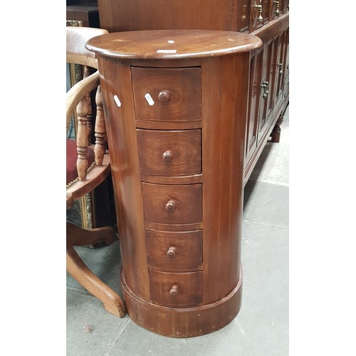 971 - A hardwood chest of drawers.