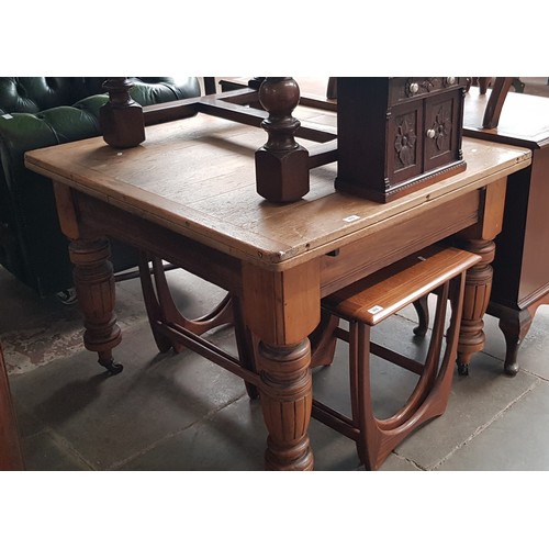 975 - A Victorian beech and pine draw leaf kitchen/dining table.