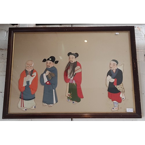 856A - An early 20th framed display of Japanese Oshie craft fabric characters, 84.5cm x 59.5cm (overall)