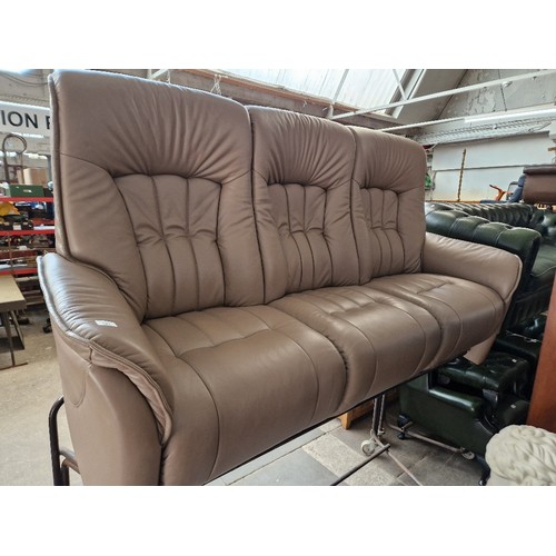 987 - An Himolla brown leather 3 seater sofa.