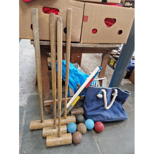 413 - A vintage croquet set.