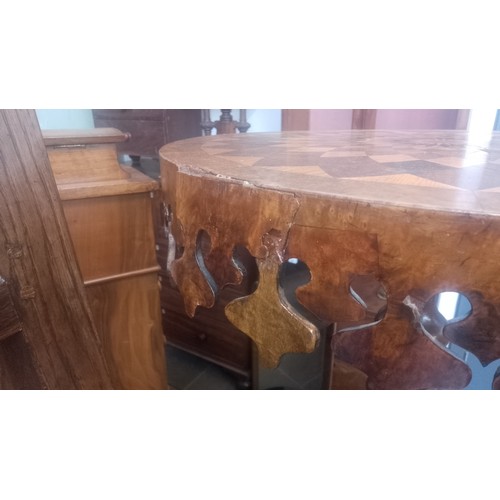 903 - A Victorian oak and walnut parquetry inlaid pedestal table with various specimen woods to the top.