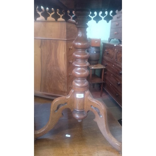 903 - A Victorian oak and walnut parquetry inlaid pedestal table with various specimen woods to the top.