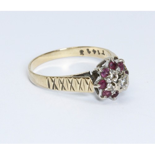 180 - A hallmarked 9ct gold diamond and ruby cluster ring, gross weight 2.6g, size N.