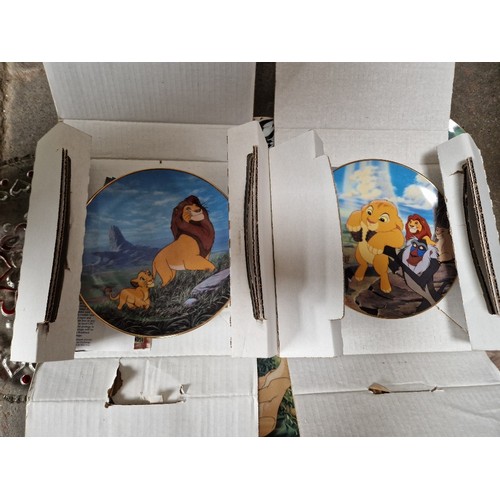 463 - Four boxes of assorted ornaments including collectors plates including Lion King, studio type potter... 