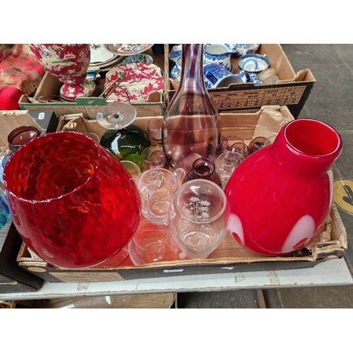 683 - Four boxes of coloured and clear glassware including decanters, glasses, vases etc by Caithness, Wat... 