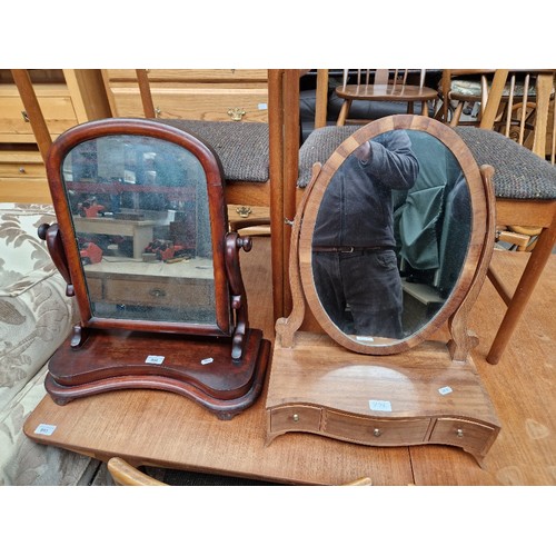 996 - A 19th century mahogany toilet mirror together with another swing mirror with three drawers to base.