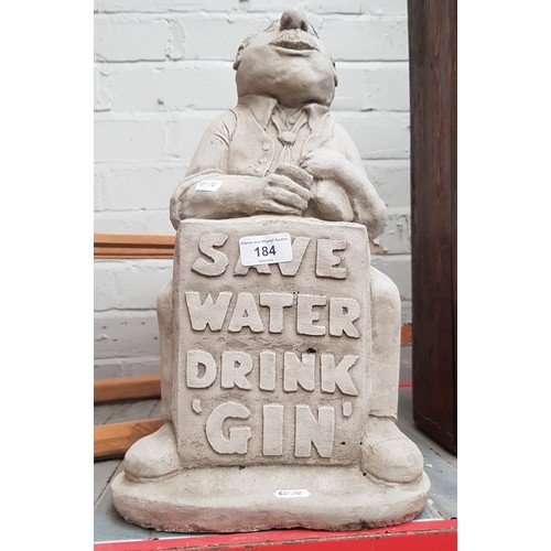 184 - A garden concrete ornament 'Save water drink gin'.