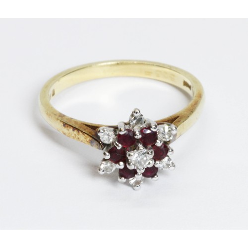 210 - A hallmarked 18ct gold diamond and ruby cluster ring, gross weight 3.2g, size K.