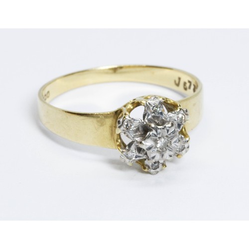 208 - A hallmarked 18ct gold diamond cluster ring, gross weight 2.5g, size N.