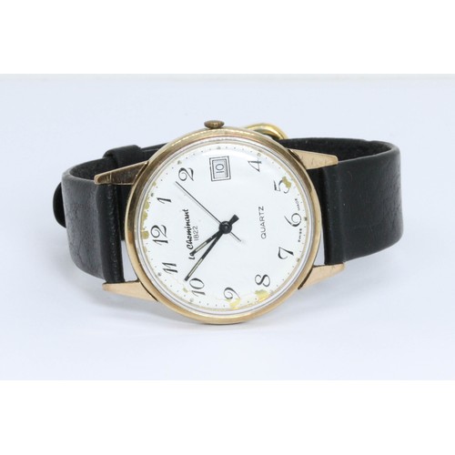 221 - A hallmarked 9ct gold Le Cheminant wristwatch, case diameter 33mm, leather strap.