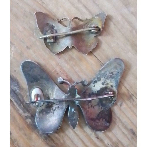 368 - A hallmarked silver and enamel butterfly pendant and another marked 'Sterling'.