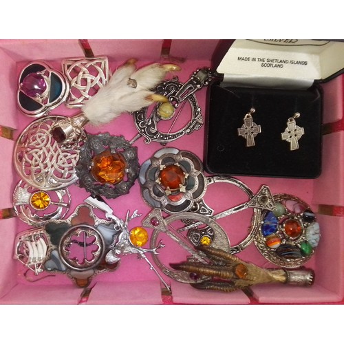 353 - A box of Scottish and Celtic style jewellery including silver.