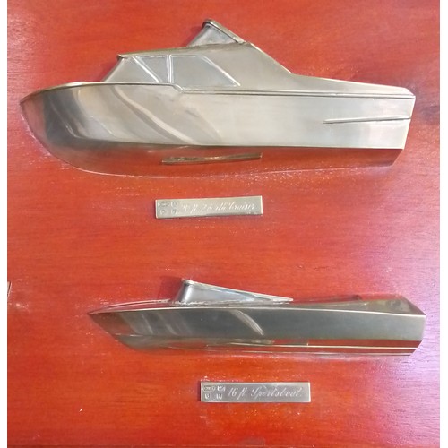 401 - A display of cast silver half hull boats, modelled after boats produced by Anchorage Ltd, Windermere... 