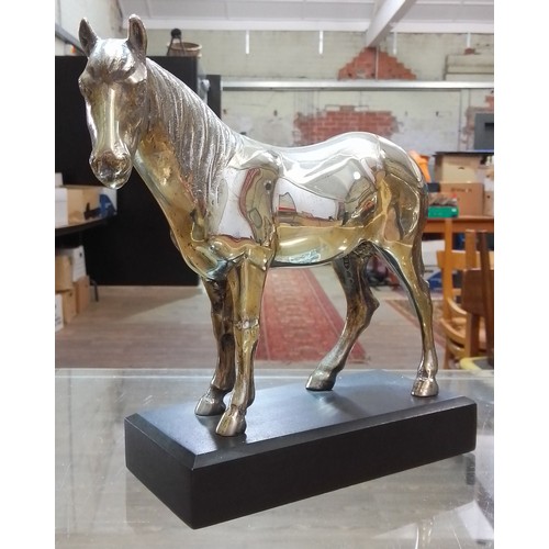 402 - A modern equine cast silver horse, hallmarked: sponsor 'CWG', London 1970, weight 41.2ozt, slate bas... 