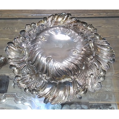 407 - A late Victorian repousse silver bowl, Walker & Hall, Sheffield 1897, diameter27cm, weight 13.4ozt.